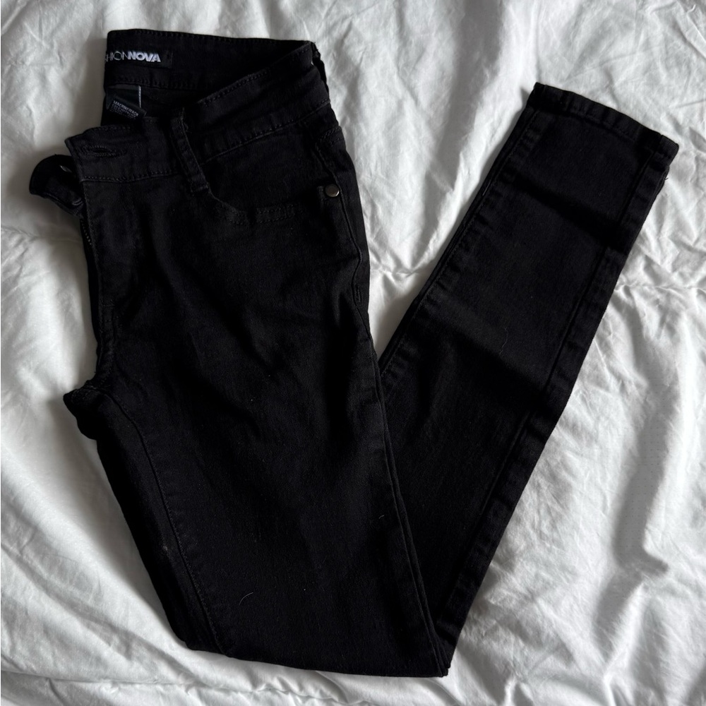 Fashion Nova Jet Black Skinny Jeans distressed back